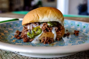 Chipotle Sloppy Joe Sliders with Havarti Cheese Sauce and Caramelized Jalapenos