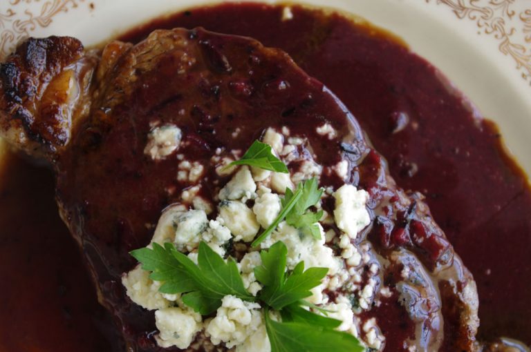 New York Strip with Spicy Blueberry Reduction and Blue Cheese