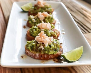 Lobster Avocado Crostini with Black Garlic Butter